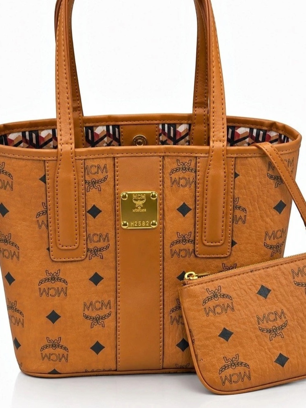 MCM small tote in cognac Like New